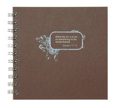 blue silkscreening on brown board journal